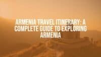 Ancient Armenian monastery nestled in mountains, golden hour lighting, scenic landscape, realistic travel vibe.