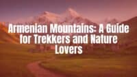 Majestic Armenian mountain landscape, snow-capped peaks against a clear blue sky, lush green valleys with ancient stone ruins, a winding hiking trail, cinematic lighting, realistic photography style.